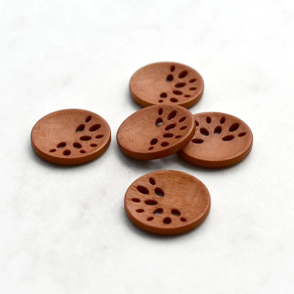 Asymmetric Cutout Round Button